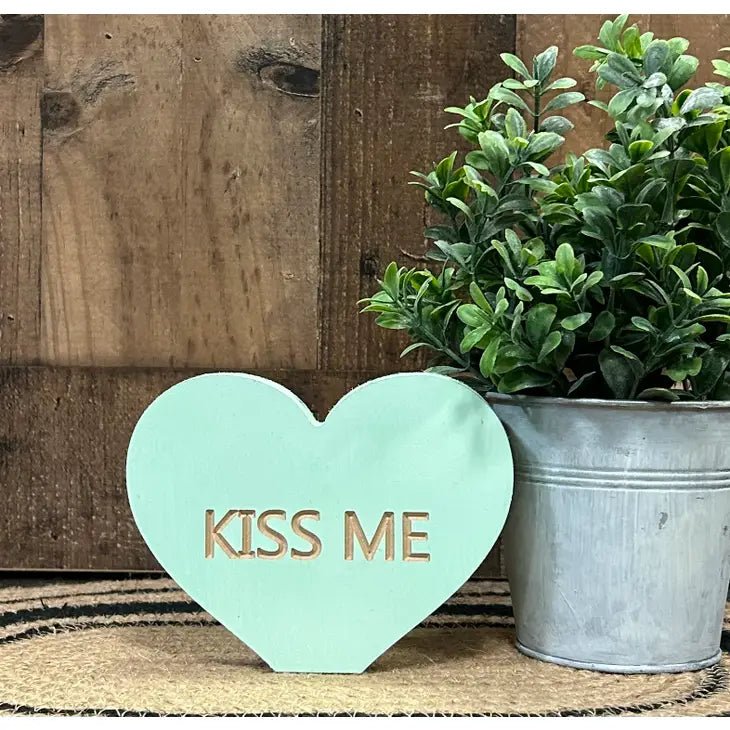 Kiss Me Carved Sign